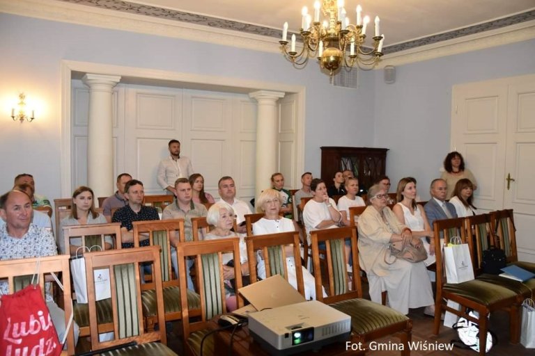 Na zdjęciu widzimy siedzących uczestników konferencji. Fot. Gmina Wiśniew